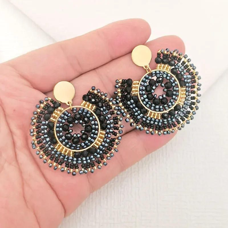 Beaded earrings Circle Sunflower Crystal Hollow out Originality Hand knitting Bohemia Alloy Tide Retro Black Rice bead earrings