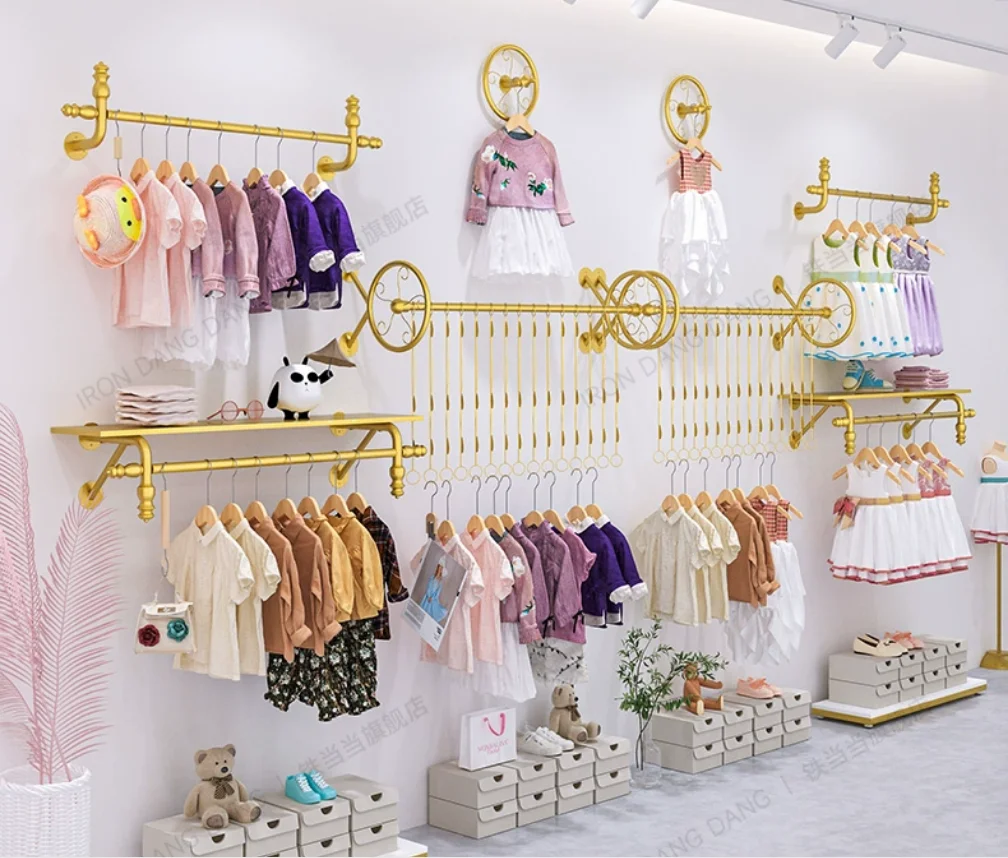 

Children's clothing store display rack, clothes rack hanging on the wall, wrought iron gold children's shelf, clothing store dis