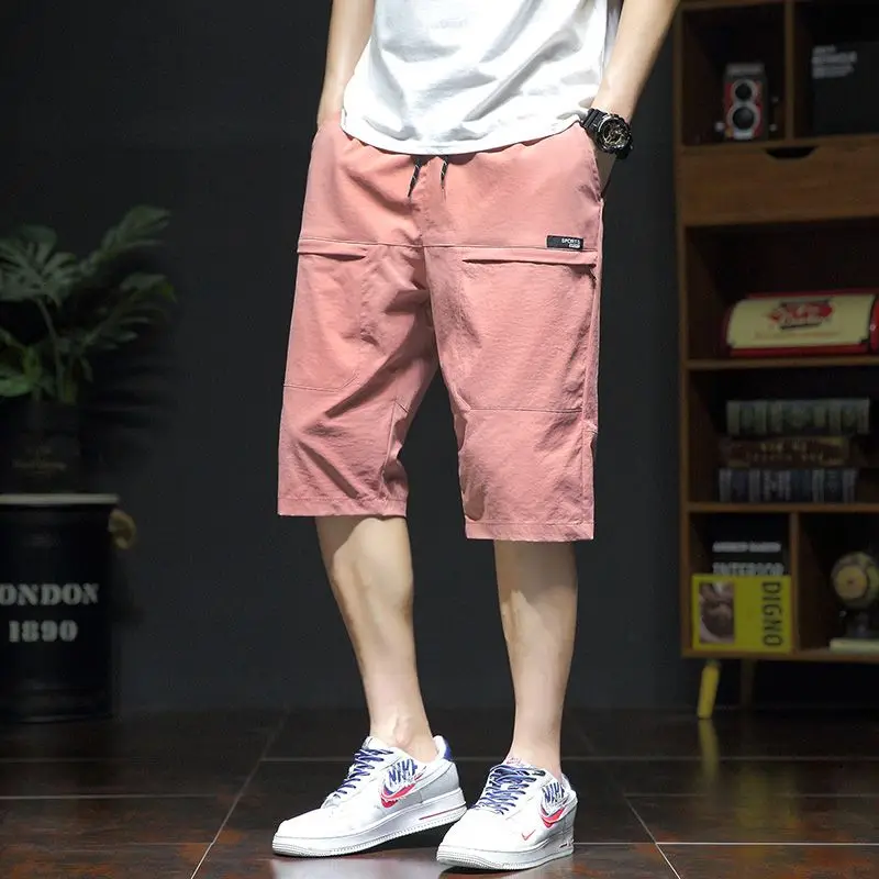 Summer New Fashion Casual Versatile Loose Beach Shorts Men Elastic Waist Drawstring Pockets Big Size Sports Straight Short Pants