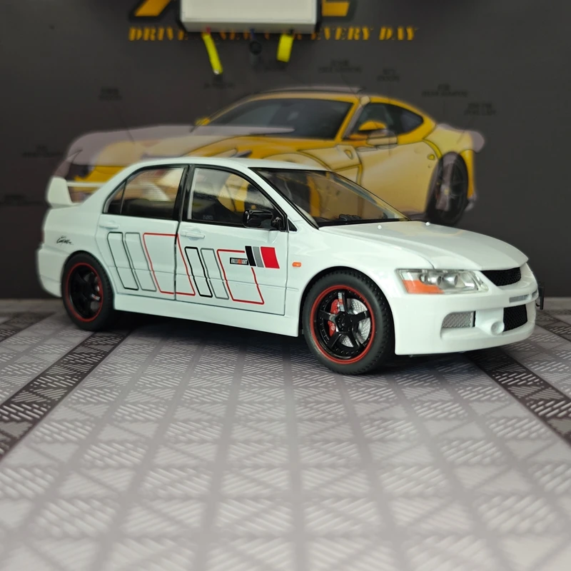 

1:24 simulation Mitsubishi EVO 9th generation alloy car model ornament, doors and engine hood, trunk can be opened