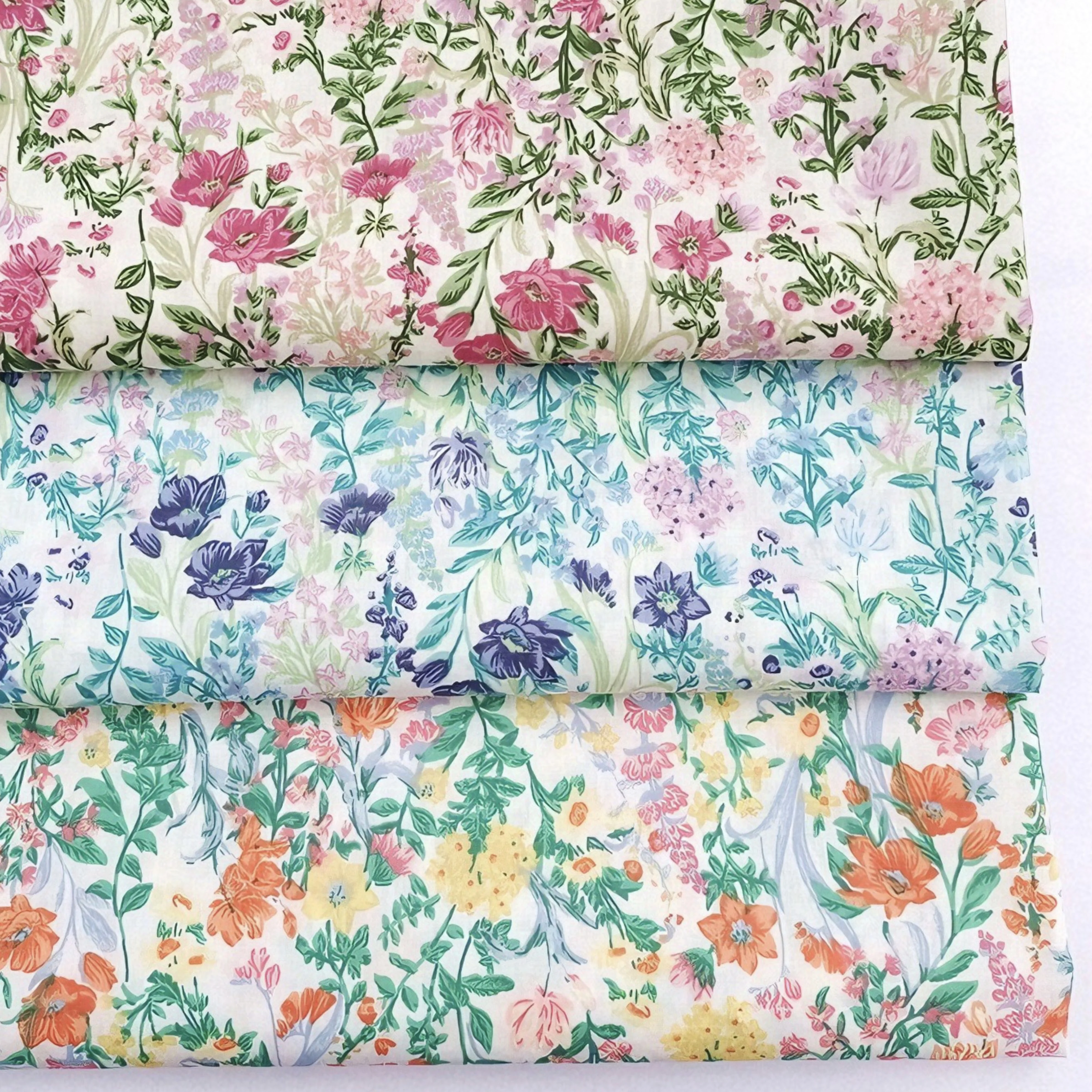 

Soft Cotton Poplin Fabrics Boasting Lively Flower Prints Great for Clothing Design Quilting and Interior Decoration Design