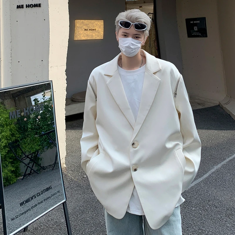 แจ็กเก็ตสูทดีไซน์เปิดไหล่มีซิปสำหรับผู้ชายทรงหลวมเสื้อคลุมสูทสไตล์สไตล์เกาหลีอเนกประสงค์แจ็คเก็ตลำลองชุดลำลองย้อนยุคฤดูใบไม้ร่วง