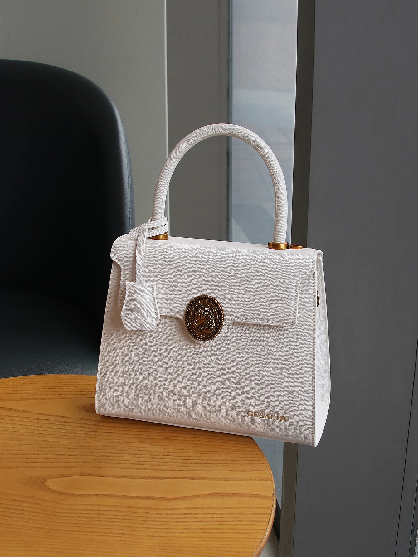 Modische neue Damenhandtaschen 2026 mit hohem Stilgefühl, Kong Quelan-förmige Handtasche mit Retro-Hardware, Joker-Handflächenmuster-Textur. – Detail 12