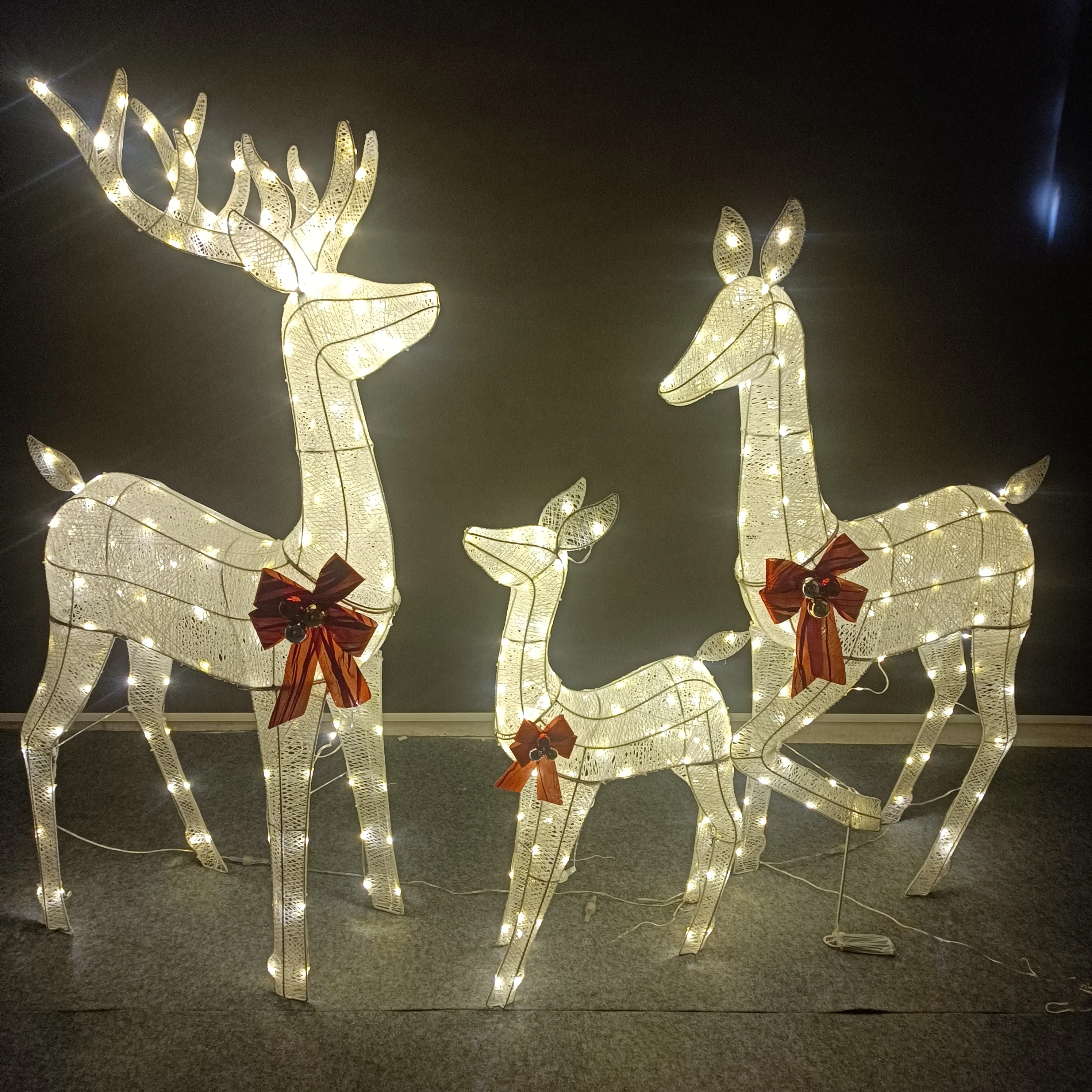 

Glowing LED Reindeer Family - Outdoor Christmas Yard Decoration with Red Bows