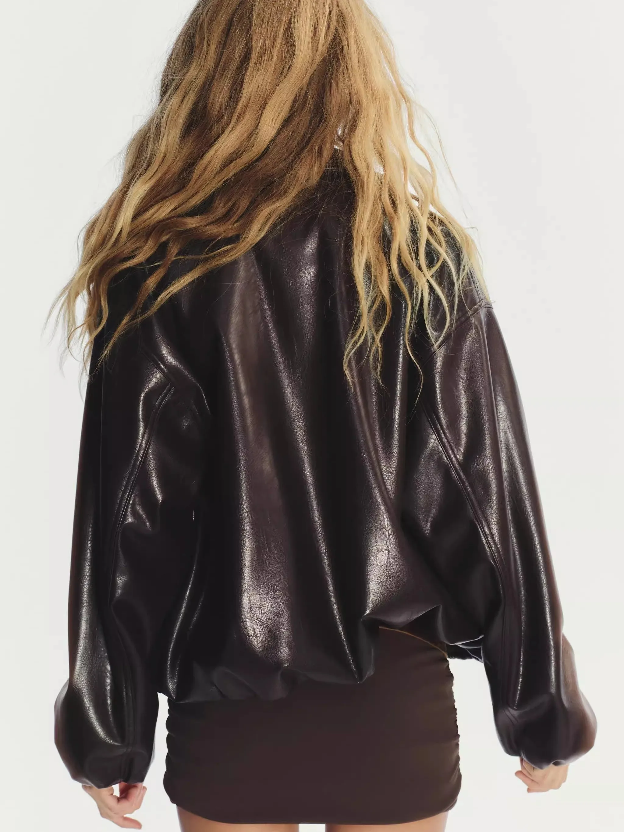 Autunno 2025 Cappotto da donna in pelle allentata casual Jaet con colletto da pilota per pendolari Cappotto da donna in pelle PU Faion