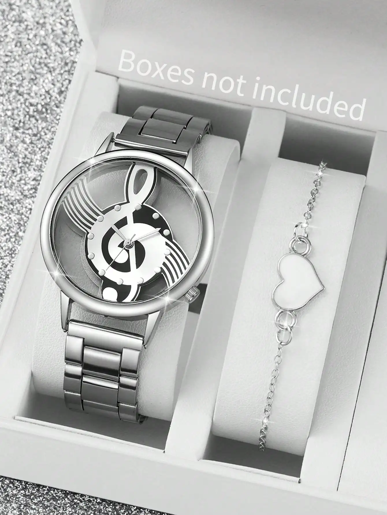 

Комплект из 2 предметов: женские кварцевые часы серебристого цвета с вырезанным дизайном + браслет с подвеской в виде сердца