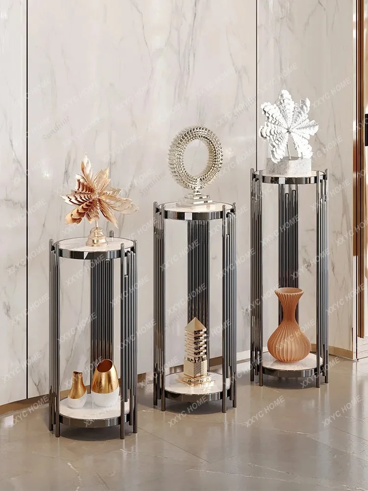 light luxury gold stainless steel flower stand, floor-to-ceiling flower stand next to living room TV cabinet
