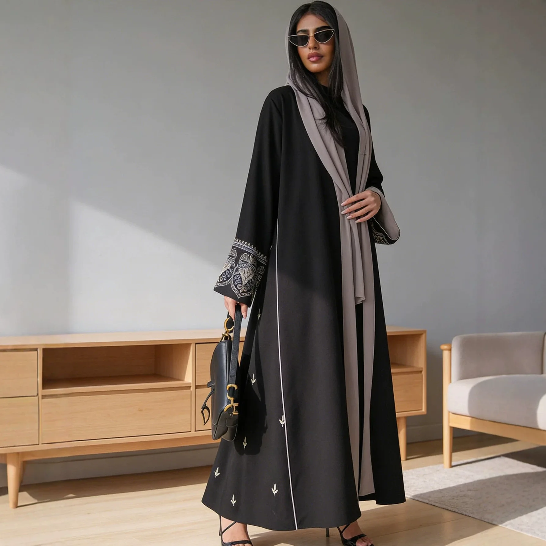 

Africa Clothing Muslim Kaftan Black Fabric Embroidered Sleeve Design White Line Accents for Gulf Region Modest Fashion Events