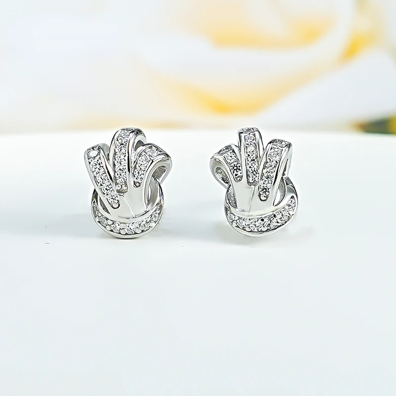 

Light luxury fashion knot 925 silver niche earrings inlaid with high carbon diamonds, small and daily personalized sweetness