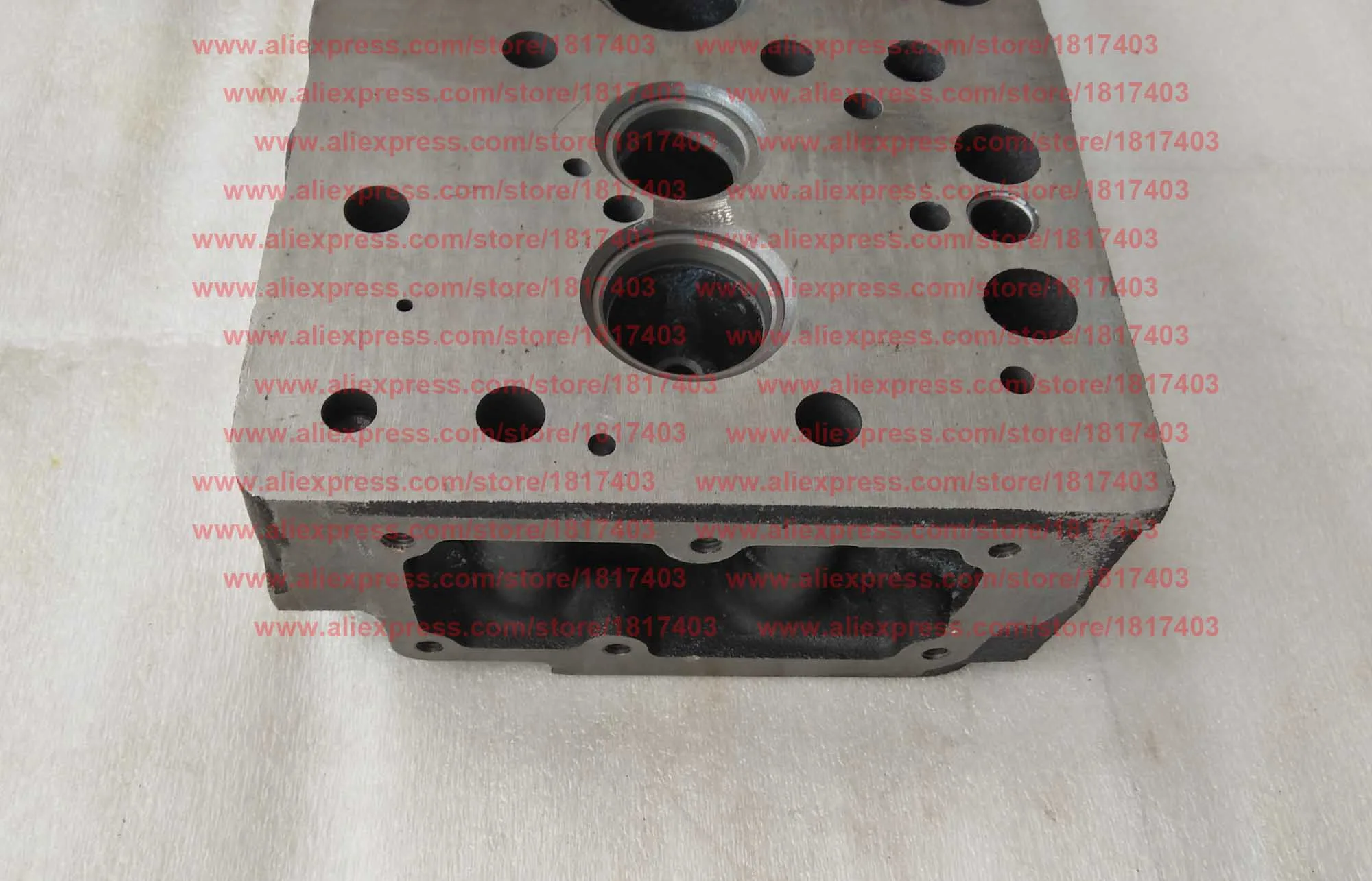 Jiangdong TY3100I.1.1-1 رأس الأسطوانة (طراز 20 مم)، أجزاء محرك الديزل Jiangdong TY3100IT