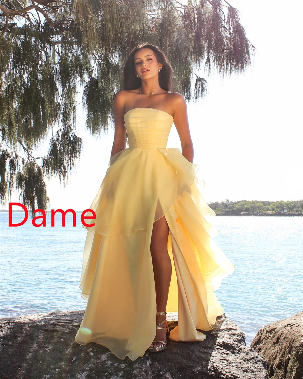 Aangepaste delicate gele organza avondjurk elegante strapless mouwloze sweep trein homecoming jurk sprankelende feestjurk