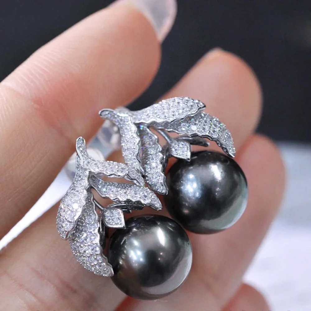 Beautiful earrings AAAA 10-11mm natural Tahitian round black pearl fashionable leaf earrings 925 silver