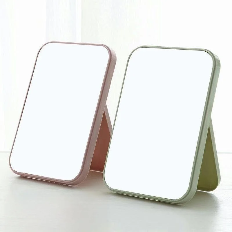 

Portable Plastic Makeup Mirror Anti-Fall Stand up Style for Office Home Use Large Size Bubble Bag Packaging Glow in the Dark
