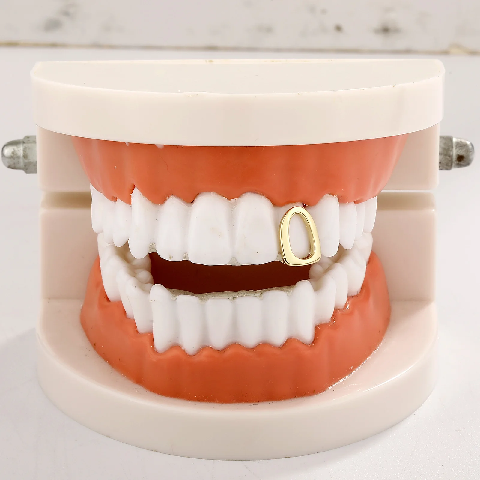 TOPGRILLZ Hip Hop Single Hollow Teeth Caps For Women Men Braces Simple Glossy Tooth Grills Jewelry Cosplay Dental Grillz