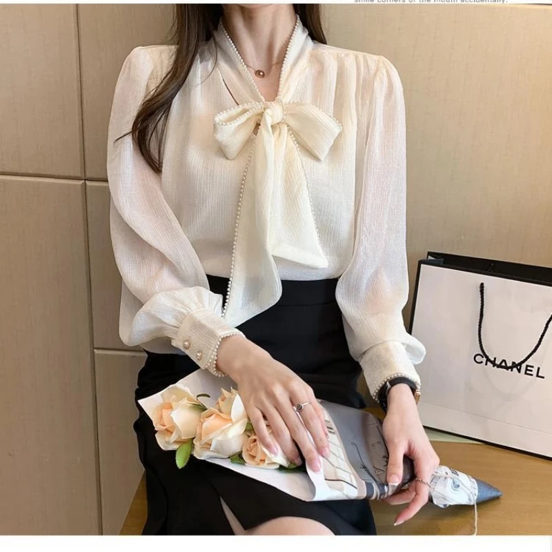 อารมณ์แขนยาวหลวมเสื้อแนวโน้ม Bow Lacing All-Match Elegant เสื้อฤดูใบไม้ผลิแฟชั่นผู้หญิงเกาหลีเสื้อผ้า