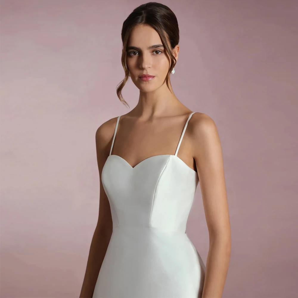 فساتين زفاف بسيطة بأشرطة سباغيتي على شكل قلب وأزرار على شكل قلب لحفلات الزفاف مفتوحة الظهر مخصصة من الساتان الاجتياح فيستدوس دي نوفيا