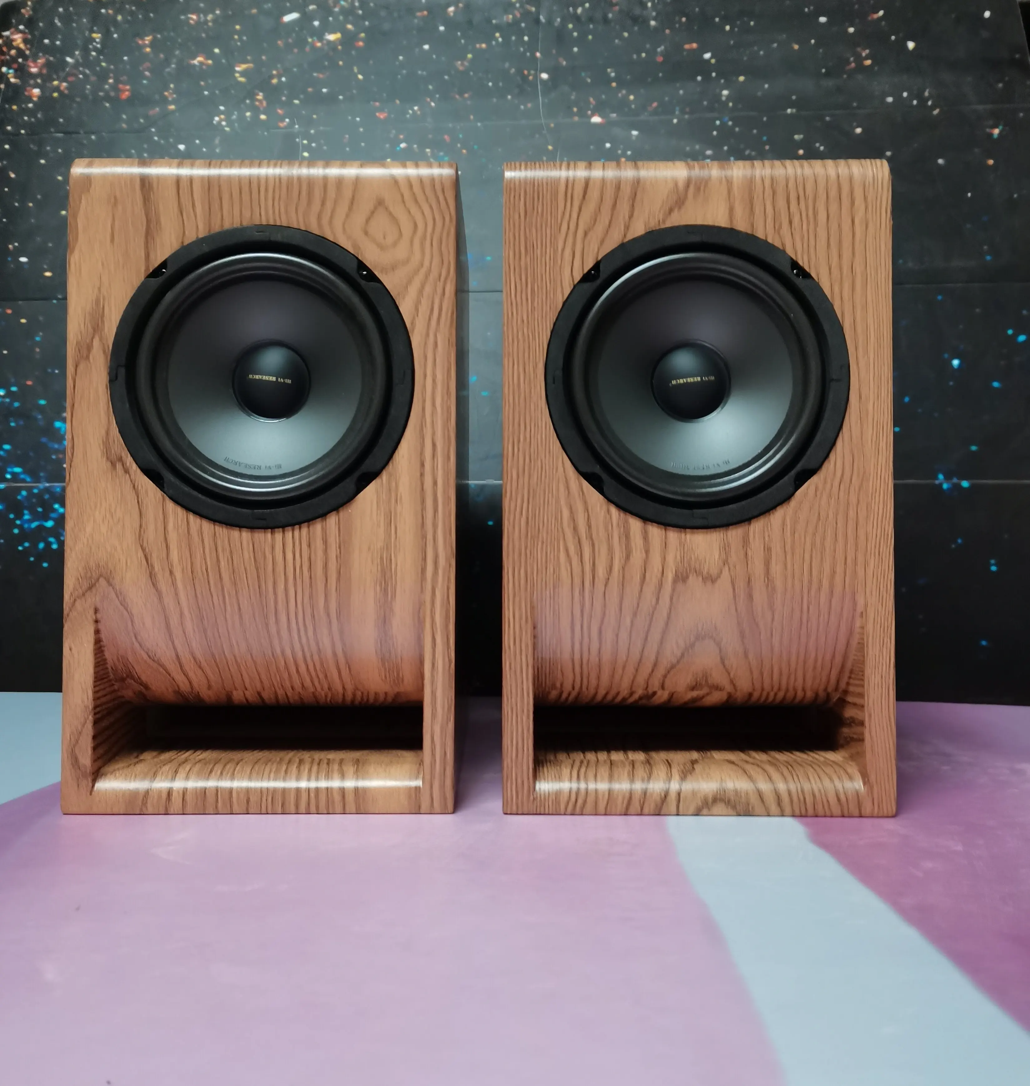 Wooden speakers, computer desktop empty box, bookshelf, a pair of stereos