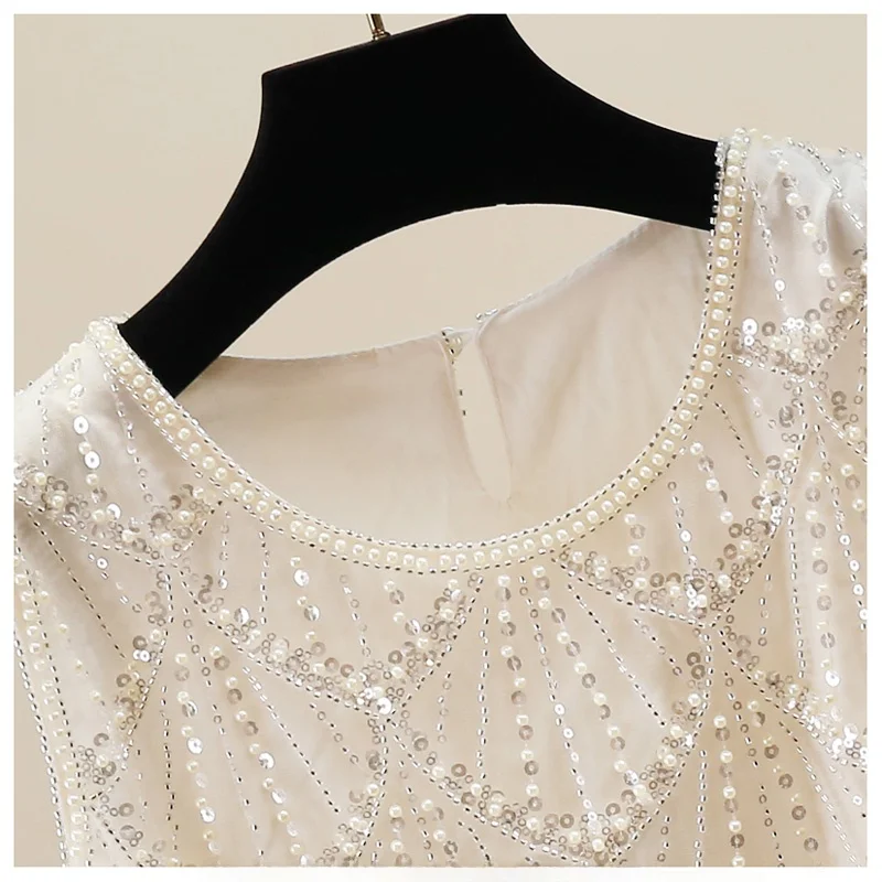 Ciężko zdobiony cekinami damski top irt Svel Ele Design koreański okrągły dekolt casualowy letni top Faion Trend