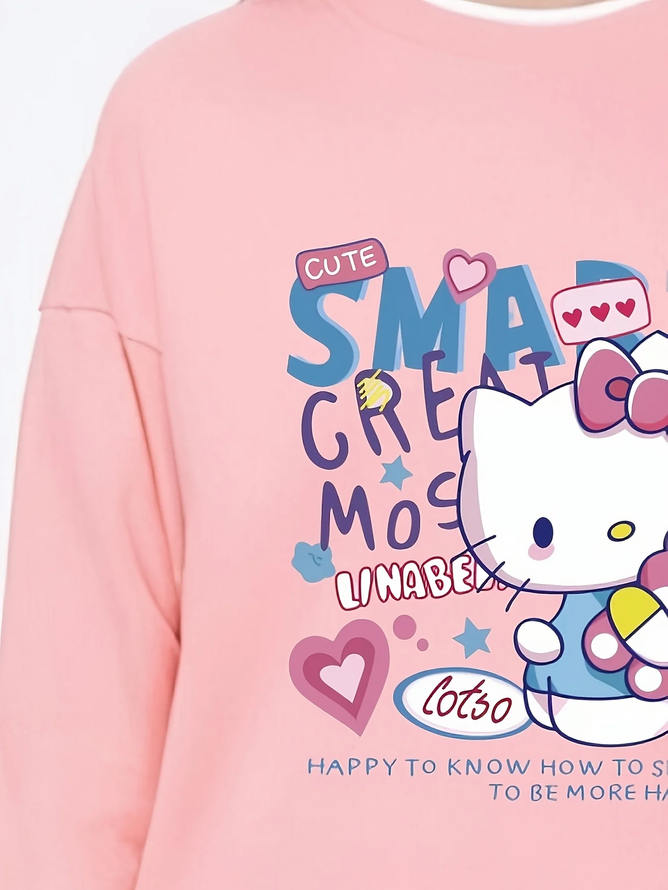 Sanrio Hello Kitty Women's Long-Sleeve Crew Neck Sweatshirt - Cute cartoon print, comfortable and stylish autumn/winter design.