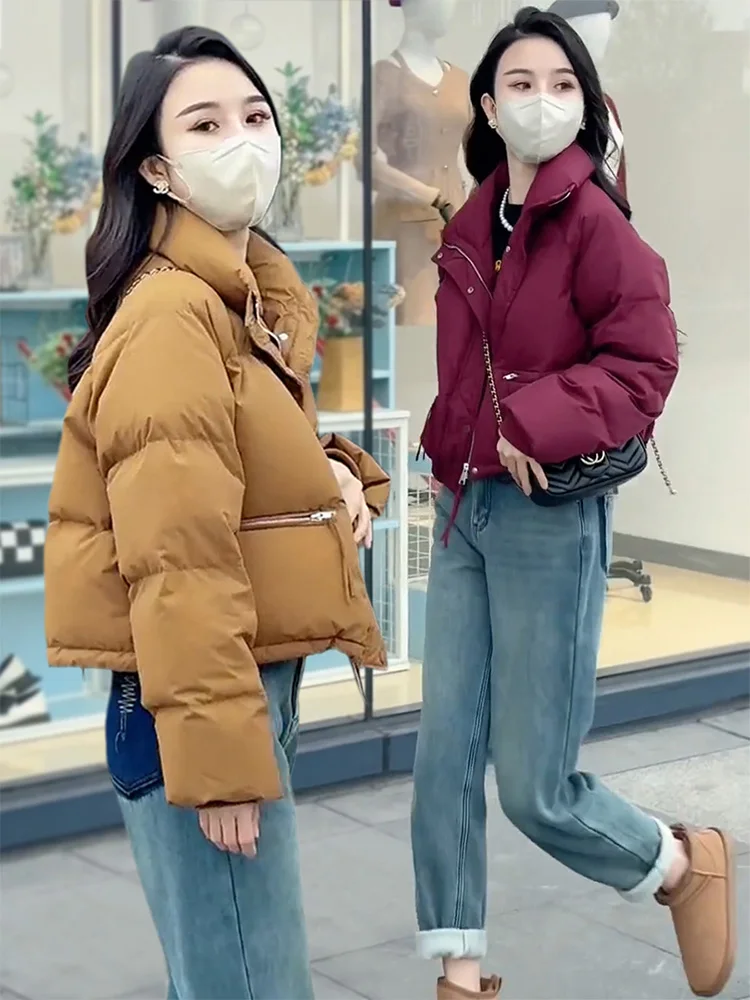 

Женская зимняя куртка-пуховик 2026: Новинка, укороченная, теплая, утолщенная, в корейском стиле, свободного кроя, с хлопковым наполнителем, маленький размер