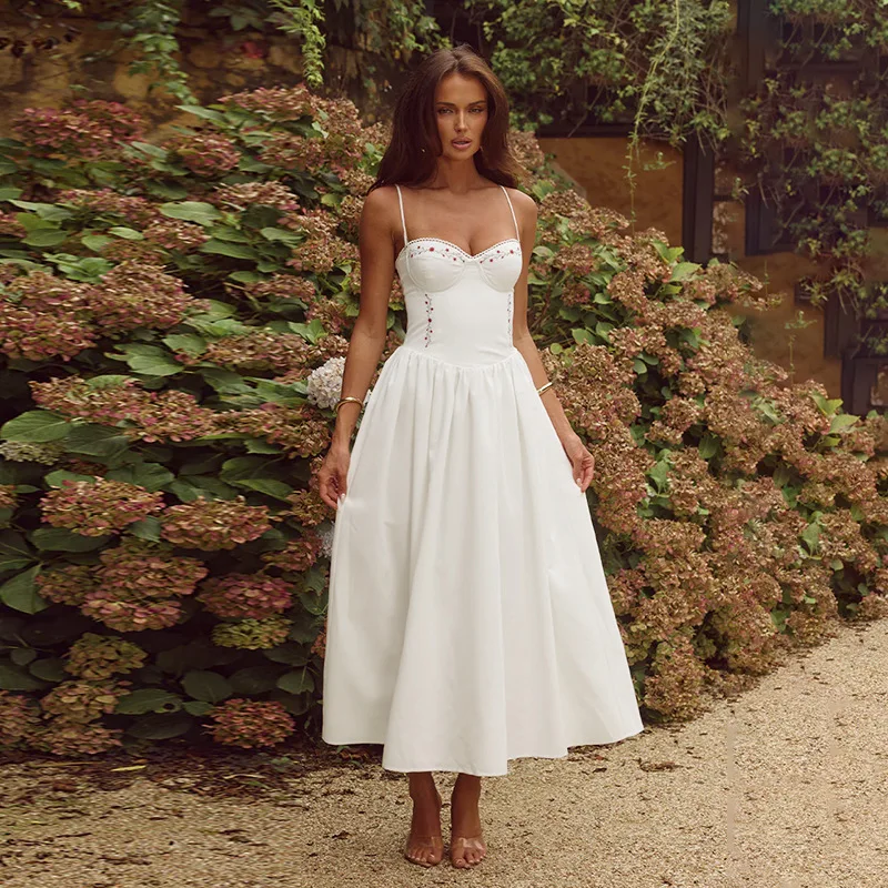 Abito femminile con bretelle a vita alta stampato dolce Abito con gonna a trapezio senza schienale con bretelle alla moda 2025 Nuove signore estive