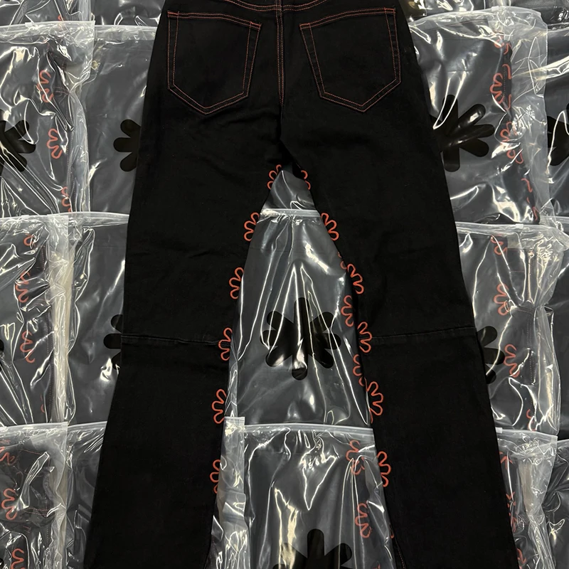 LOSTSHDWS jean tournesol détaillé ajouré broderie américaine haute rue Patchwork jambe droite Streetwear