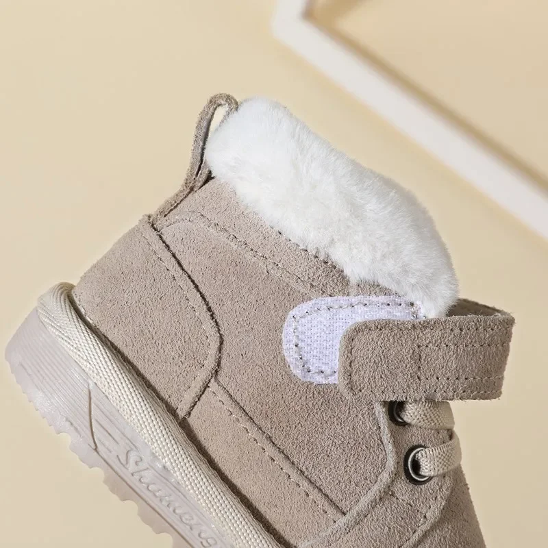 Nuevas botas de nieve de invierno para bebés, zapatos bonitos de cuero Unisex para niños y niñas, zapatillas de deporte de algodón cálidas para niños, zapatos de bebé de fondo suave para niños pequeños