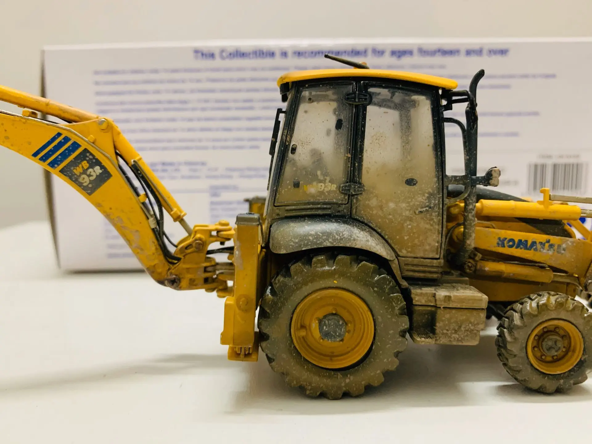 Komatsu WB93R-8 Backhoe Loader Muddy Version 1:50 Scale DieCast Model UH8142 New