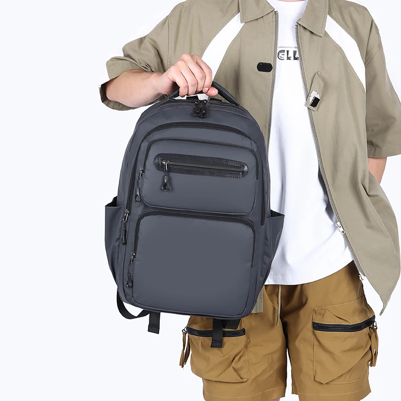 Tas ransel pria warna Solid, tas ransel pria kapasitas besar, tas ransel Oxford anti air, tas sekolah untuk pria