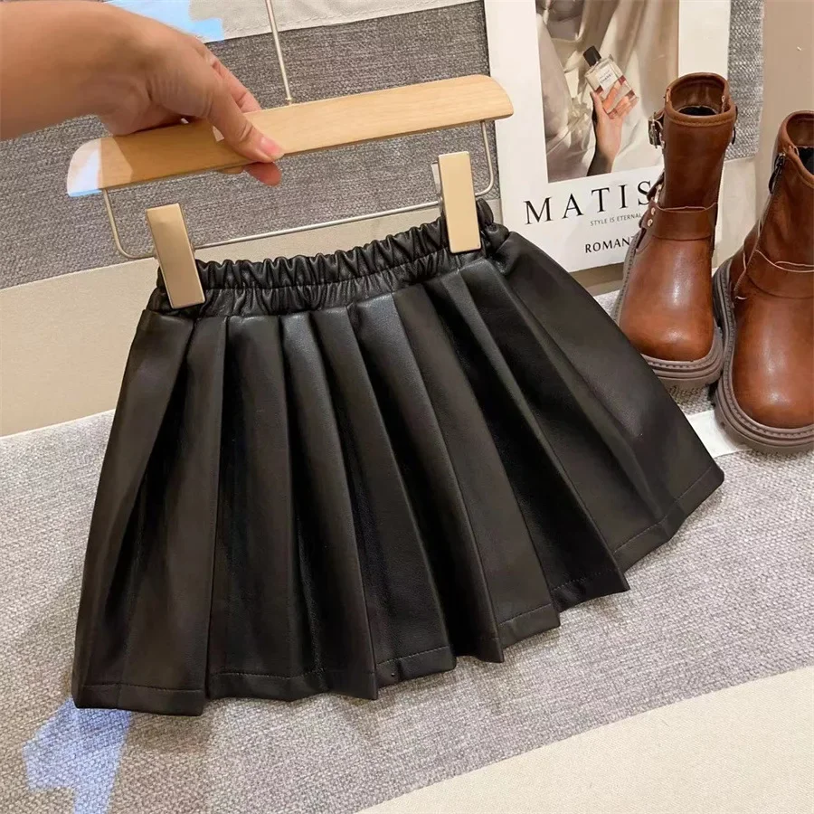 Children clothing autumn and winter new baby girl PU leather skirt Korean version half skirt solid color girl pleated skirt