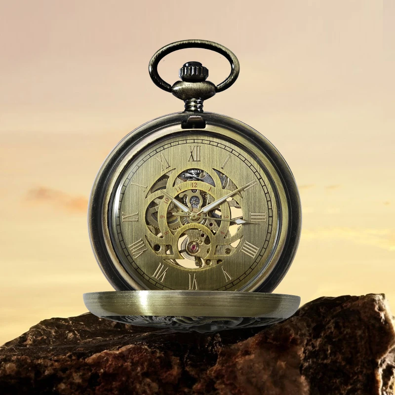 Bronze vintage mechanical pocket watch The shape of a dragon on the surface The outer ring of the back is patterned