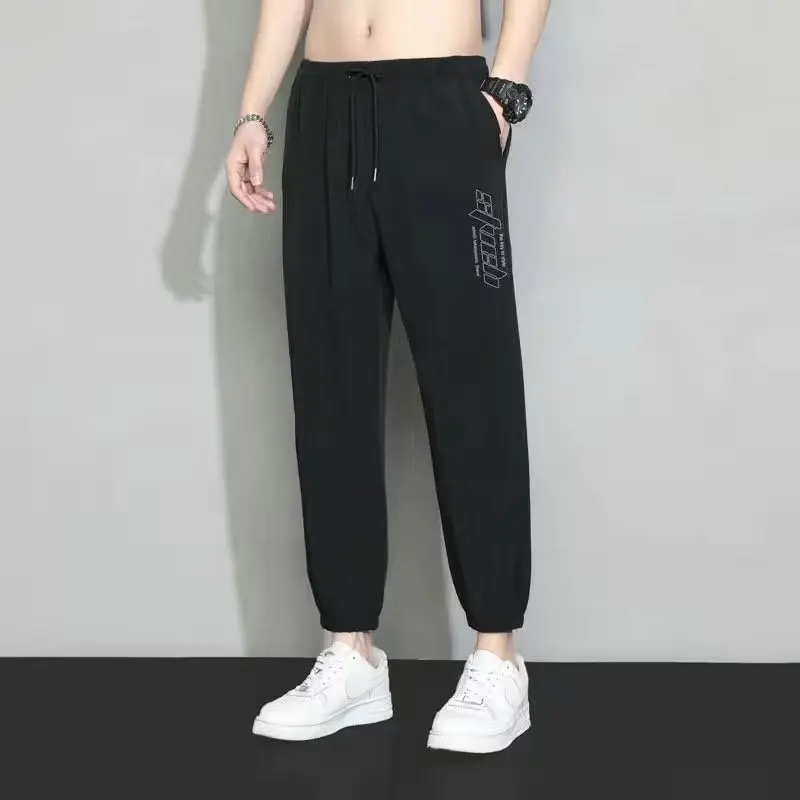 กางเกงทำงานฤดูร้อนของผู้ชายผ้าไหมน้ำแข็งแห้งเร็วระบายอากาศได้ดีลำลองหลวมขนาดใหญ่ฮาราจูกุ สเล กางเกงเก้าจุด