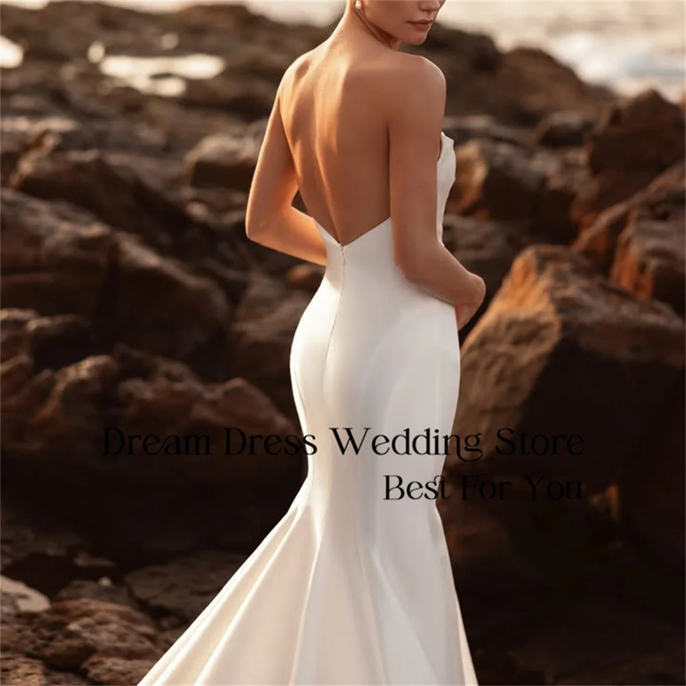 DREAM Abito da sposa moderno con pieghe a sirena 2025 Abito da sposa in raso con scollo a barca aperto sul retro con strascico lungo Abiti da sposa personalizzati