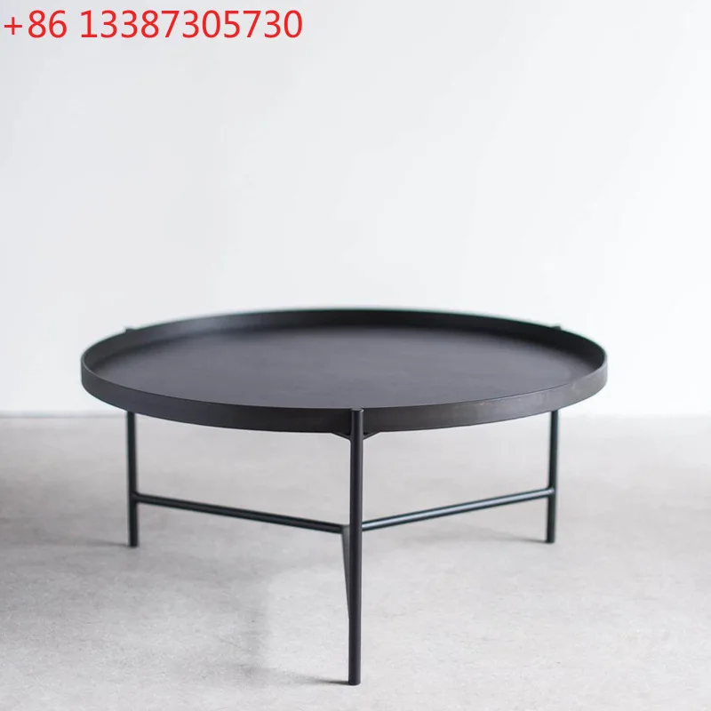 

Living room sofa corner few round coffee table small apartment modern simple round table