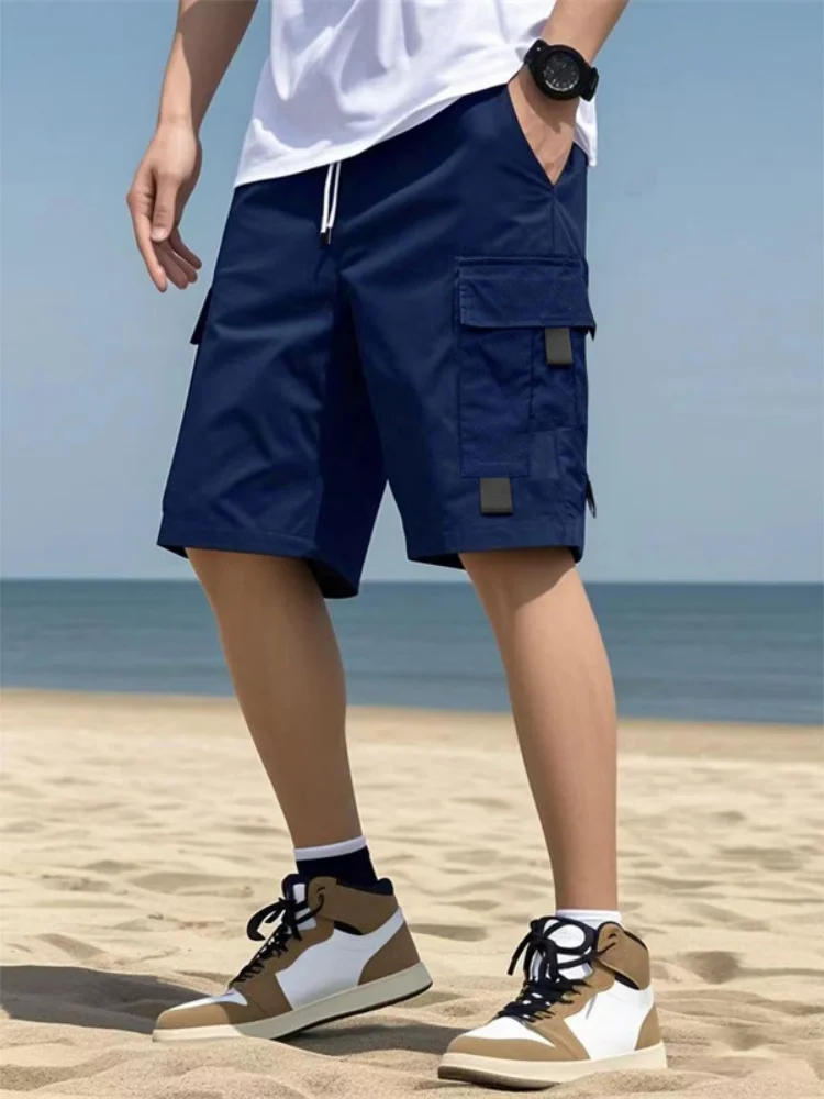 

2025 Summer new style Men's pure color casual cargo shorts Men loose straight leg multi pocket drawstring five quarter pants