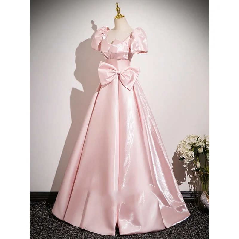 2025 New Women's Pink Satin Dress Fashionable, Slim and Elegant Annual Meeting Bow Decoration Long Back Strap Dress