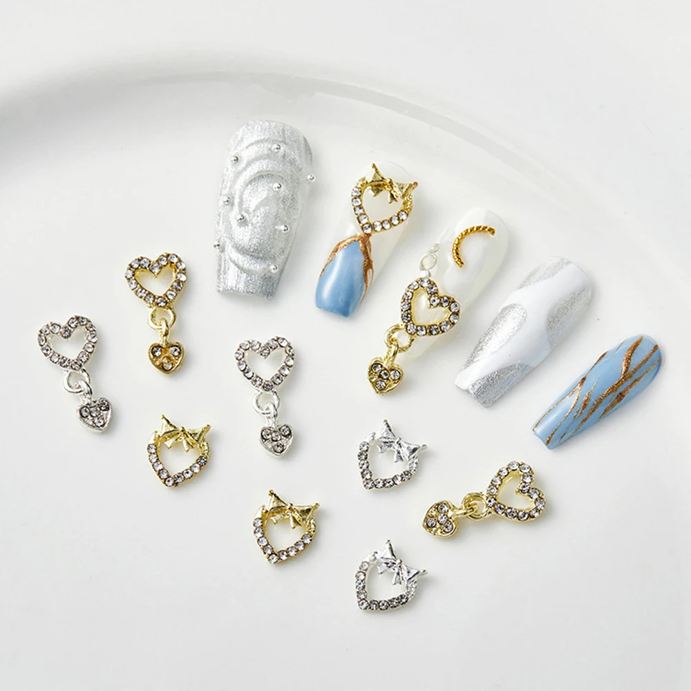 

10pcs Hollow Heart Pendant Nail Art Charm 3D Gold/Silver Metal Diamond Love Bowknot Nail Decor Parts DIY Japanese Nail Parts