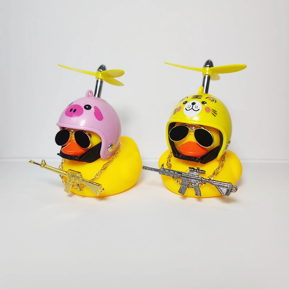 Cool Car Rubber Yellow Duck Ornaments Car Interior Decoration Accessories with Weapon Toy Gun