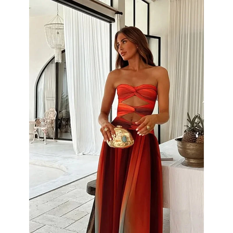 JINIA ชุดเดรสแม็กซี่พิมพ์ลายสีสันสดใสกลวงออกเอวสูงเซ็กซี่ชายหาดวันหยุด 2025