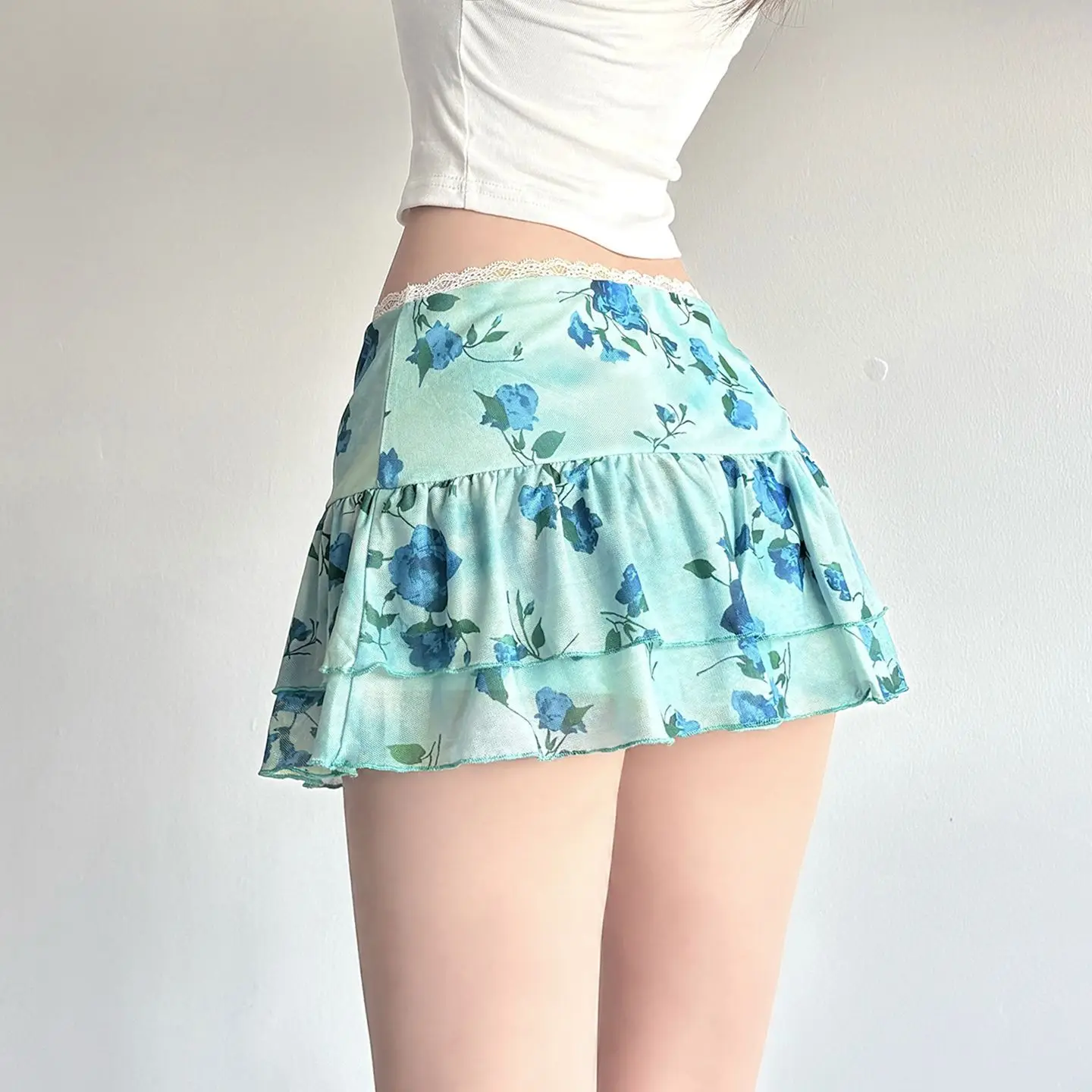 تنورة كعكة شبكية وردية مطبوعة باللون الأخضر المقرمش، تنورة هوتي منخفضة الخصر من الدانتيل الحلو والحار