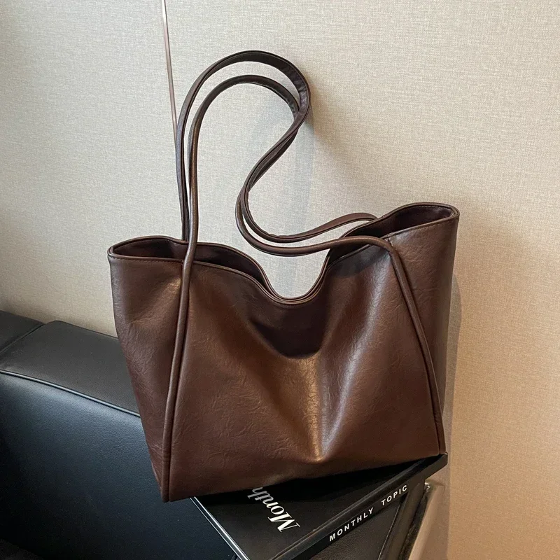 

Повседневная Сумка-тоут из искусственной кожи, лидер продаж 2024, вместительная сумка, однотонная модная сумка, модная сумка на плечо, женская сумка