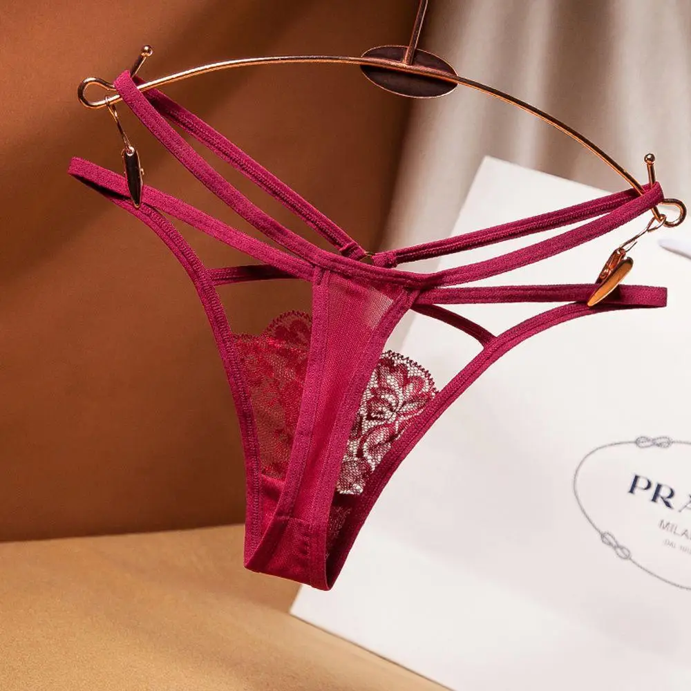 Tanga de encaje con cinturón cruzado para mujer, bragas transparentes, Sexy, flor de perla