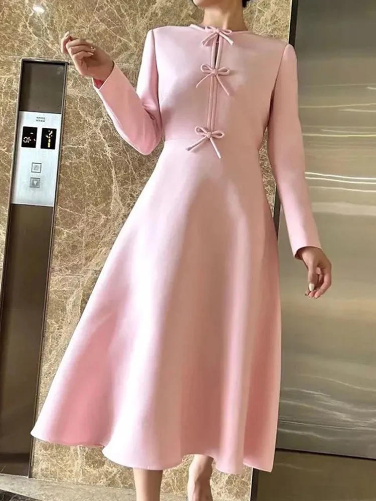 Retro elegance pink round neck long sleeve bow tie dress 2024 women\'s autumn new high waist and long A-line skirt.