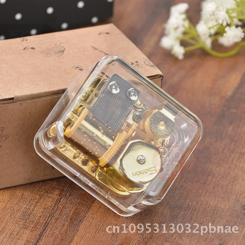 

Gold Plated Wind-up Acrylic Music Box Transparent Square Home Decoration Creative Gift with Assorted Popular Tracks European