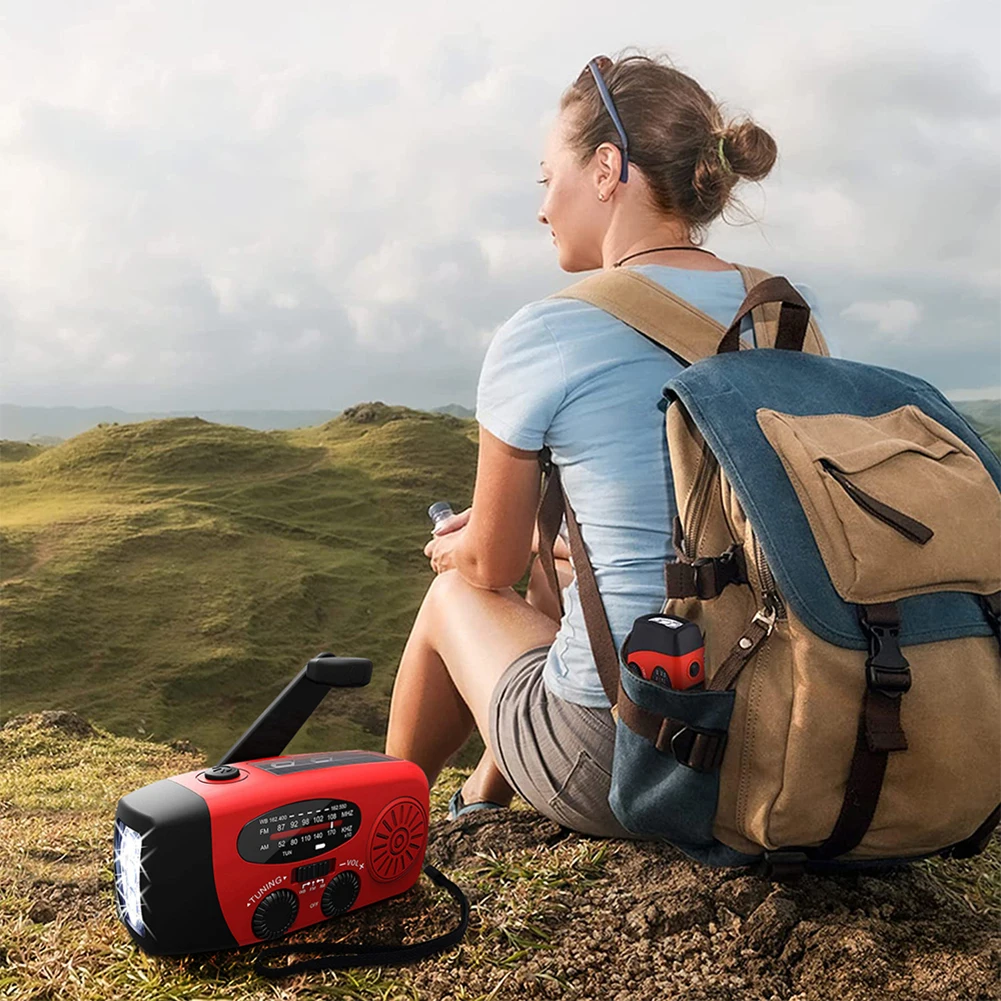 راديو الطوارئ AM/FM/NOAA 600mah USB 5V كرنك اليد تعمل بالطاقة الشمسية راديو الطقس المحمول المدمج في المتكلم 1.5 واط للتخييم
