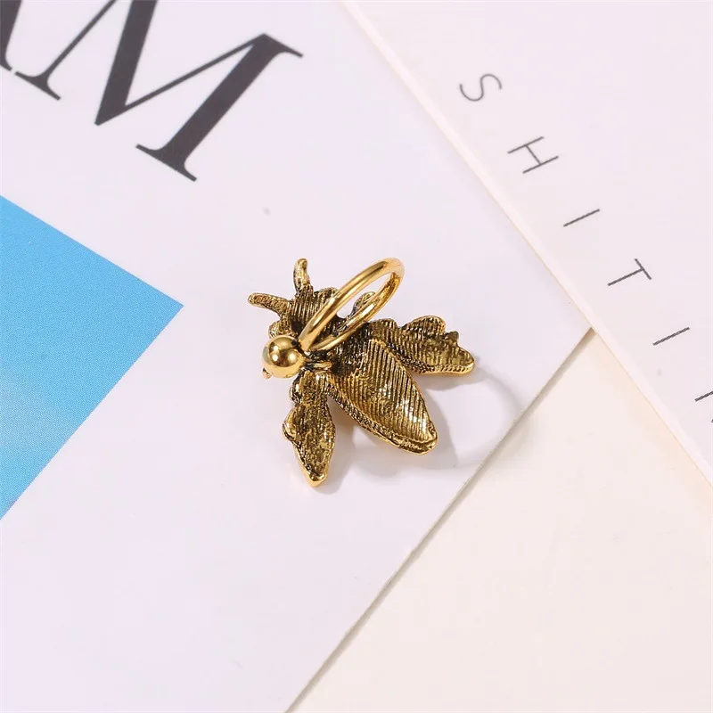 Modyle Vintage Little Bird Bee Leaf Ear Cuff Non Pierced Clip Earrings for Women Trendy Punk Small Carved Rose U Shape Earrings view 3