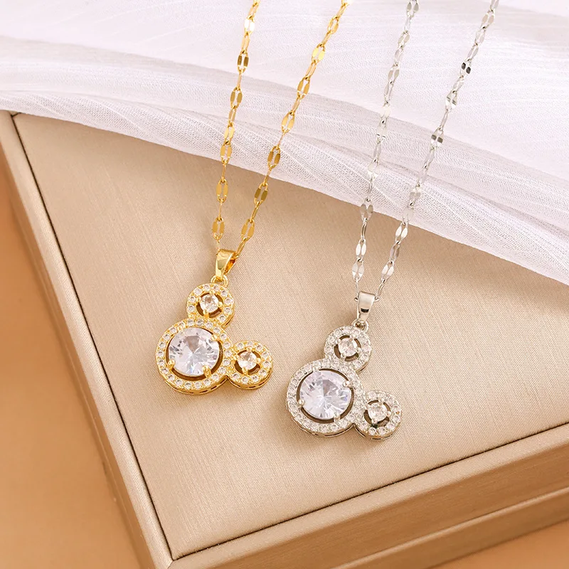 

The Mickey head pendant is a light luxury and niche design accessory for women, exuding a sweet and elegant charm
