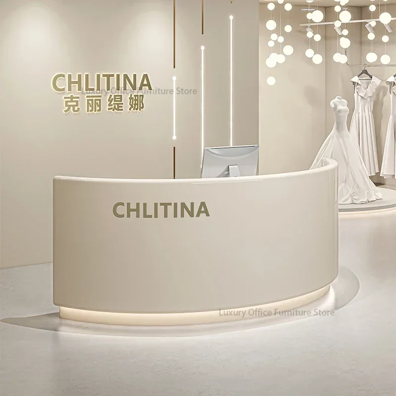 

Simple Modern Clothing Store Cashier Curved Cream Style Front Reception Desk Beauty Salon Bar Reception Luxury Desks Furniture