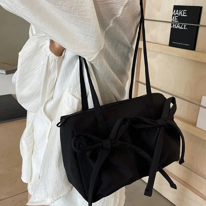 2024 New Bow Nylon Shoulder Bags Women Fashion Korean Large Capacity Lightweight Commuter Handbags Simple Casual Solid Tote Bags