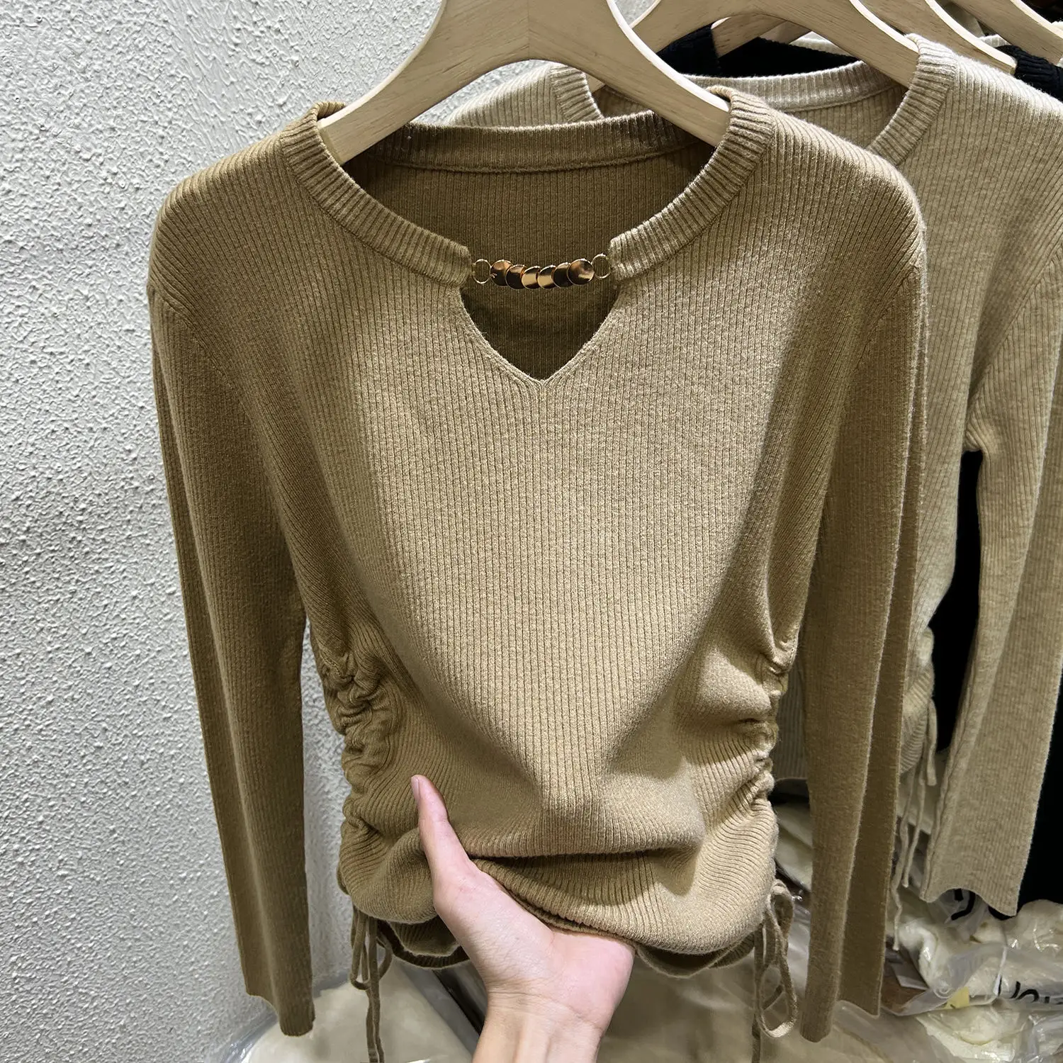 Design Drawstring Hollow Sweater Long Sleeved Autumn and Spring 2024 New Slim Fit Niche Temperament Knitted Top JJ36